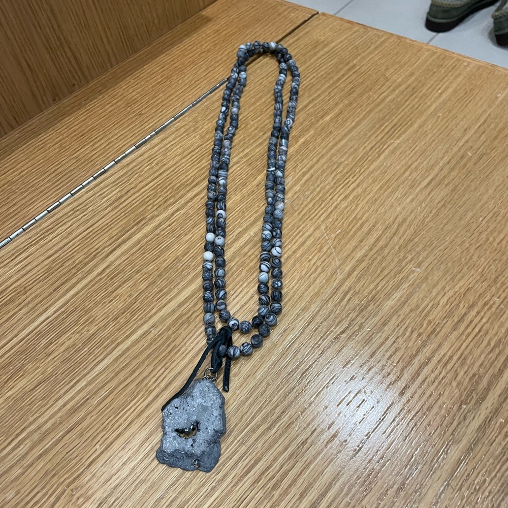 Gray bead necklace with pendant